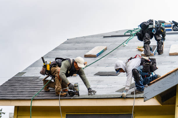 Professional Roof Replacement technician working in Roosevelt, NJ